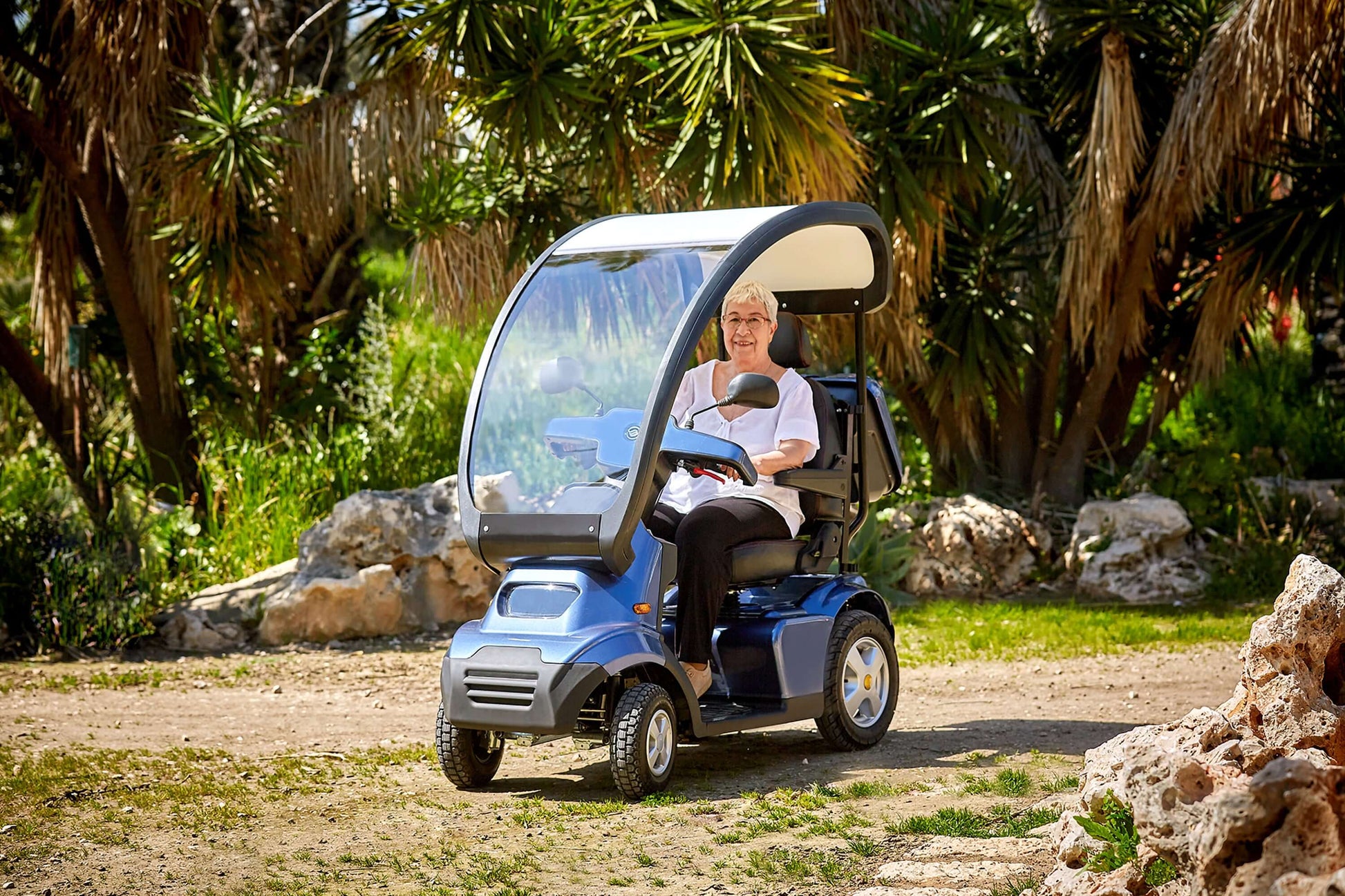 Afiscooter S4 Mobility Scooter - with canopy in outdoor setting