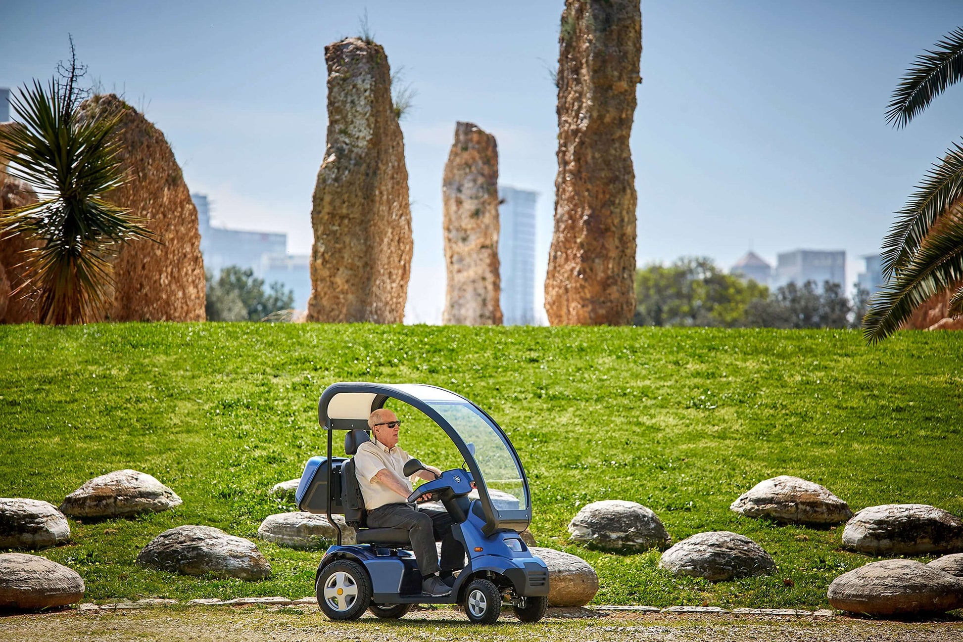 Afiscooter S4 Mobility Scooter - with canopy in outdoor setting