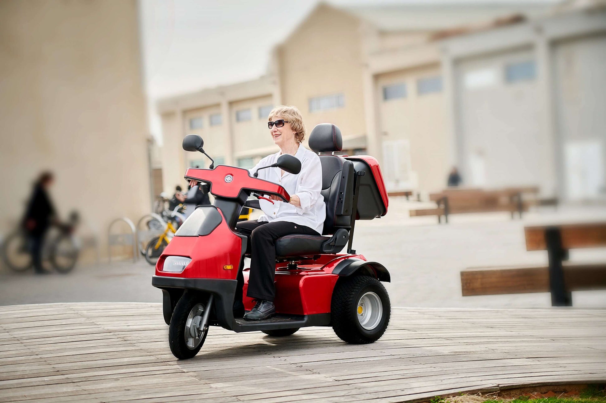 Afiscooter S3 Mobility Scooter - red with single seat outdoors