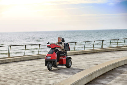 Afiscooter S3 Mobility Scooter - red with single seat outdoors ocean