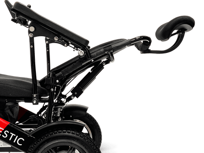 Majestic IQ-9000 Long Range Electric Wheelchair With Recline (17.5” Or 20” Wide Seat) - reclined red and black with standard fabric close up